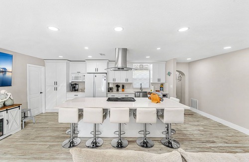 Cocoa Beach House | Spacious Home w/Private BBQ Backyard Oasis, Bikes & Games – Walk to the Beach!