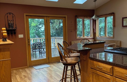 Ortonville House | Spacious home with a large deck and ample space for beautiful sunset viewing!