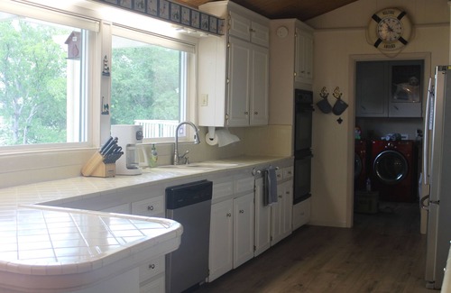 Chandler House | Spacious lakefront home with private dock and 2 living areas.