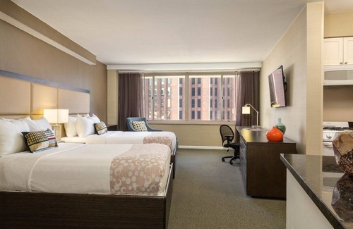 Logan Square House | Spacious Suite with Kitchen | City Views | Rooftop Pool | Pet-Friendly