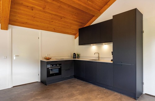 Municipality of Ede House | Spacious wellness home for 6 guests with a private sauna and hot tub in the garden. Stylish, single-floor layout and designed for pure relaxation.