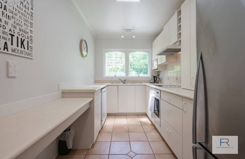 St. Heliers House | Spanish Charm: Stylish 3BR Steps from the Beach