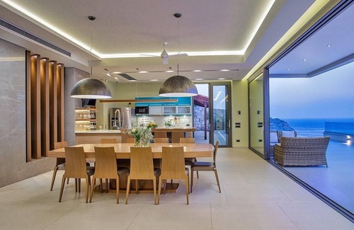 Agia Pelagia Villa | Sparkling ocean views with heated pool
