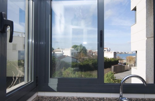 L'Escala Apartment | Spectacular apartment with communal pool and views of the port