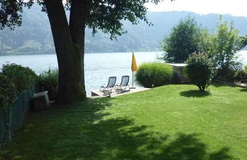 Sattendorf House | Spectacular lake house with private beach, bathing jetty and a large garden
