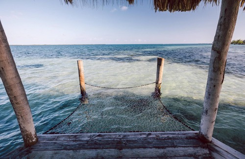 Thatch Caye House | Spectacular Ocean Views Cabana w/Private Oceanfront Balcony & Walk-In Shower