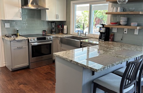 Mira Costa House | Spend your time in this luxury home overlooking Private Golf Course