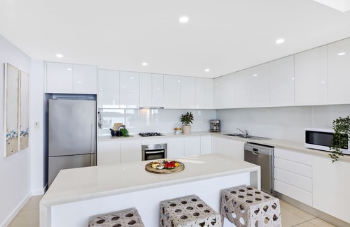 The Entrance Apartment | Spiral staircase to 2 level rooftop Penthouse with Hot spa & BBQS