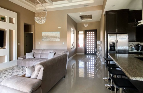Brownsville House | Stately retreat with backyard oasis - pool, inviting patio - plus modern kitchen