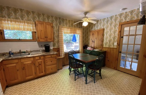 Greentown Cottage | Stay at the Little Red Cottage and enjoy Lake Wallenpaupack in the Poconos.