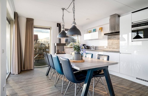 Akkrum House | Stay in our spacious Sneekermeer 8 home with private jetty.