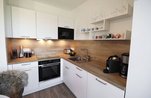 Tossens Apartment | Steernkieker Tossens - Relax in style. Roof terrace. Close to the beach.