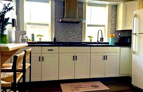 Pawtucket Apartment | Step into a serene stay where electric charm meets cozy coastal tranquility.