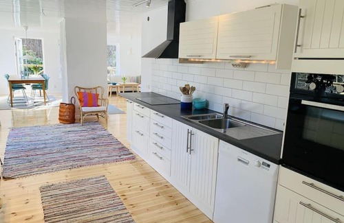 Varmdo House | Stockholm archipelago with pool, boat and bikes