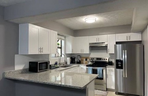 Stone Mountain House | Stone Mountain Delight, Smart TVs in Every Room, Pool Table, Desk and Backyard!