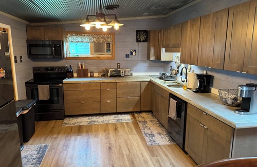 Ruth Cottage | Stones Throw Cottage - Beautiful beach within 2 miles of both major campgrounds