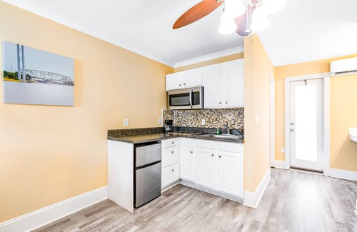 Surf City Apartment | Studio condo with ocean views, pool, deck, & central AC