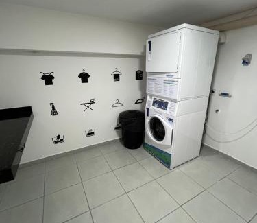 Enseada Apartment | Studio Guarujá, vista ao mar