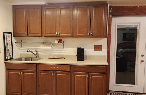 Hanover Apartment | Studio w/3 beds, 1 Queen, two twin, couch, pellet stove, full amenities, shower.
