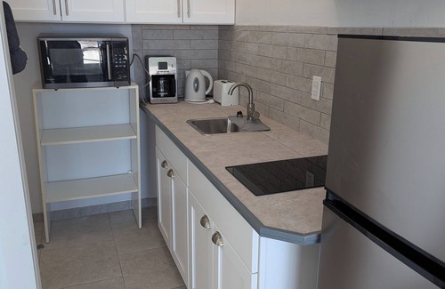 Schooner Bay Apartment | Studio,Waterfront,Kayaks,300m to stunning beach & bonefish flats,Boat Hire