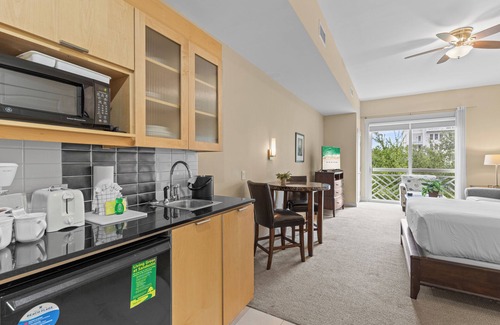Baytowne Wharf Condo | Stunning Bahia Studio Condo at Wharf! Beach Tram, Tropical Pool, and Hot Tub!