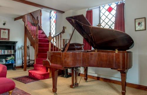 Wadeford House | Stunning baptist chapel with concert piano, pets welcome