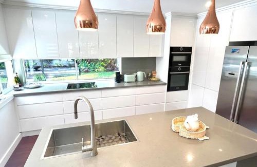 Warriewood House | Stunning Family Home with Tropical Garden