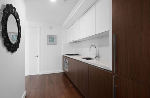 Sutton Place Apartment | Stunning new 1BR | Deck + Lounge | Upper East Side