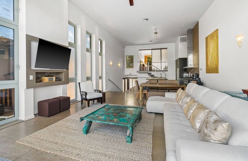 Lihue Apartment | Stunning Oceanfront Penthouse, 14' ft Ceilings and Wall-to-Wall Glass Slider.