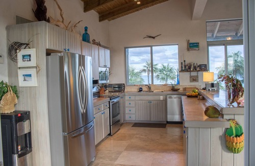 Savannah Sound House | Stunning, Private, Pink Sand, Beachfront Estate with 70ft dock on Bonefish Flats