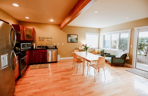 Leland House | Stunning views of Leland Harbor & Fishtown, and sunsets between the Manitou's!