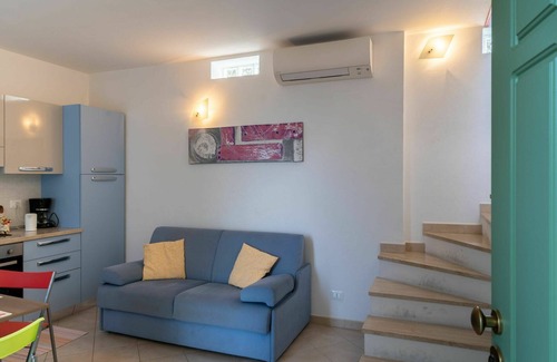 Terzorio House | Stunning villa for 4 people with A/C, WIFI, TV, terrace, pets allowed and parking