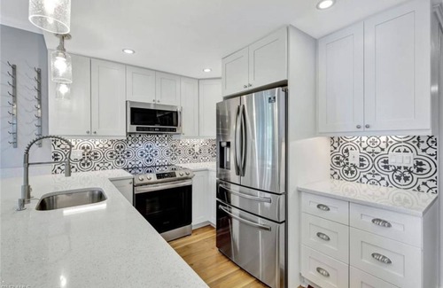 Central Naples Condo | Stylish 2-bed condo in a vibrant tennis community, 4 miles from Downtown Naples!