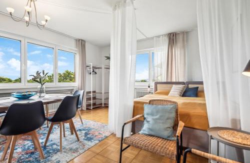 Denzlingen Apartment | Stylish Oasis with Panoramic view