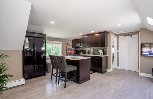 Huntington Station Apartment | Stylish Upscale Apt w/Snack Bar & Sunny Deck