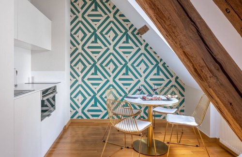 Nogent-le-Roi Apartment | Suite Millesime, View on Saint-Sulpice church, castle and timber-framed houses