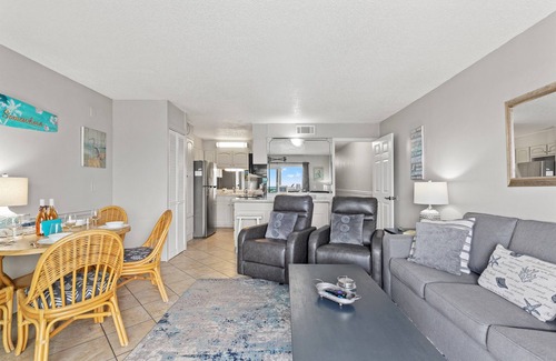 Thomas Drive Condo | Sun-Kissed Bliss Skip Elevators 2nd Floor Beachfront + Free Chairs & Tikki