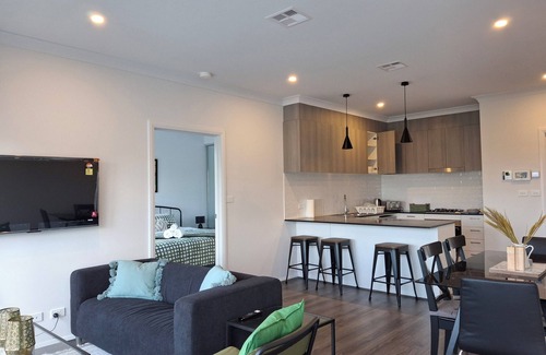 Taylor House | Sunlit Suburban Haven