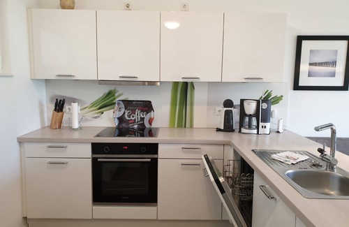 Schillig Apartment | Sunny first floor apartment directly on the dog beach, free laundry packages
