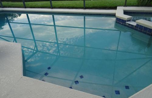 Sandy Ridge Villa | Sunny lake view villa with pool spa - close to attractions