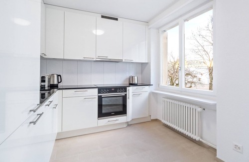 Oerlikon Apartment | Sunny Oerlikon 3.5 Room w/Balcony, 1min to Train Station, by Blueground