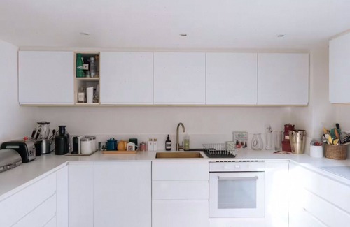 Porte-Saint-Martin Apartment | Sunny Parisian Flat by Canal Saint-Martin