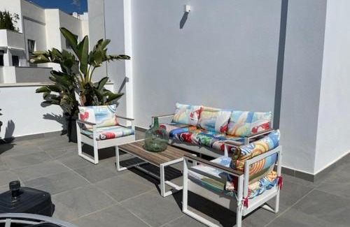 Velilla-Taramay Apartment | Sunny penthouse beach apartment with panoramic views