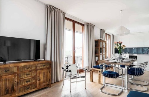 Kleparz Apartment | Sunny penthouse in New York style