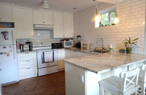 St-Adolphe-d'Howard House | Sunny south-facing lakefront cottage with sauna close to ski hills and trails