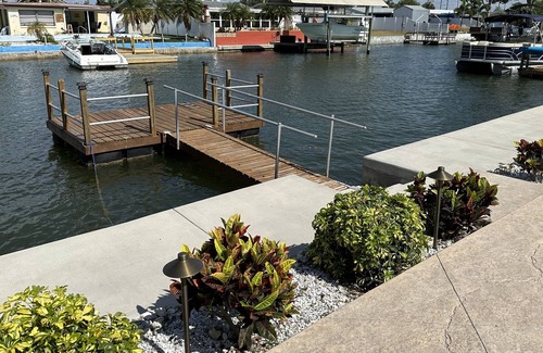 Sea Ranch On The Gulf House | Sunny Waterfront Oasis! Private Pool, Hot Tub & Dock!