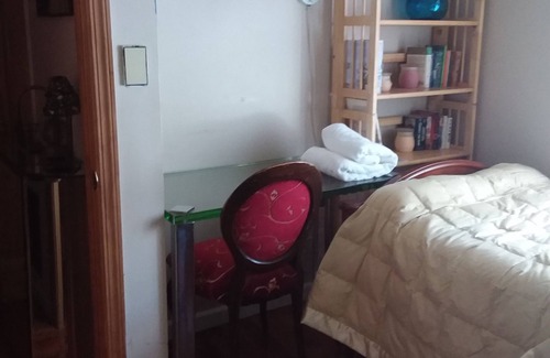 Irvington House | Sunny Window by the Bed