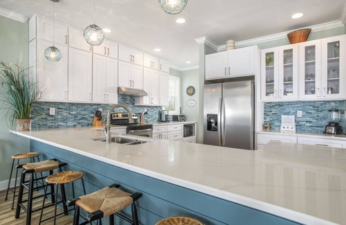 Straits House | Sunset Bay Retreat- Sound Front Home with Dock
