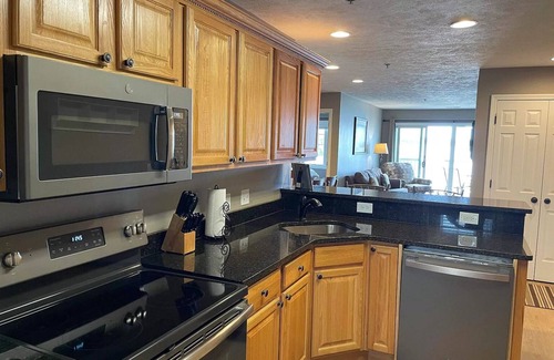 Cadillac Condo | Sunset Shores Resort Lake Cadillac Mi. Waterfront 2-bedroom 2 bath condo.