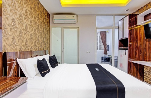 Depok Hotel | Super OYO Collection O 90253 DHelomi